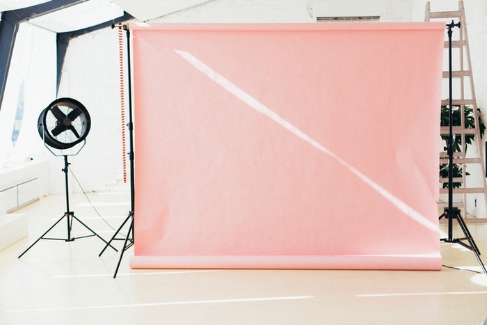 Pink backdrop in a home photo studio 