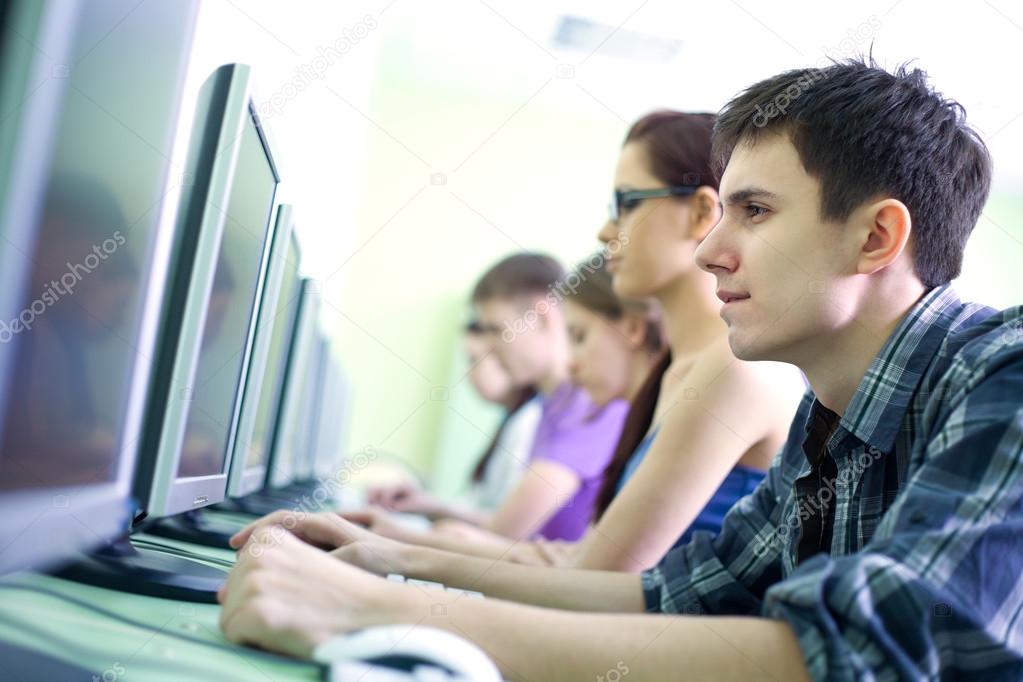 depositphotos 55958655 stock photo teens in internet cafe