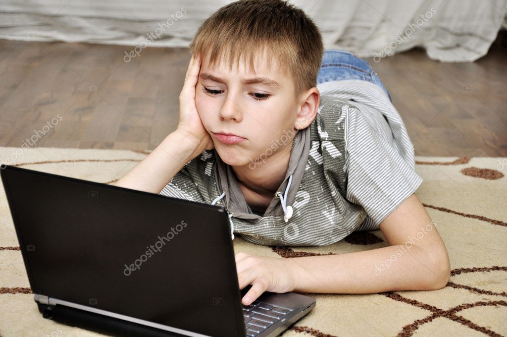 depositphotos 6076460 stock photo little boy with laptop