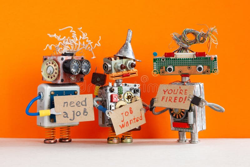 Automated dismissal and hiring of staff. The relationship between employer and employee. robot boss dismisses personnel. And shows cardboard You are fired. Two stock photography