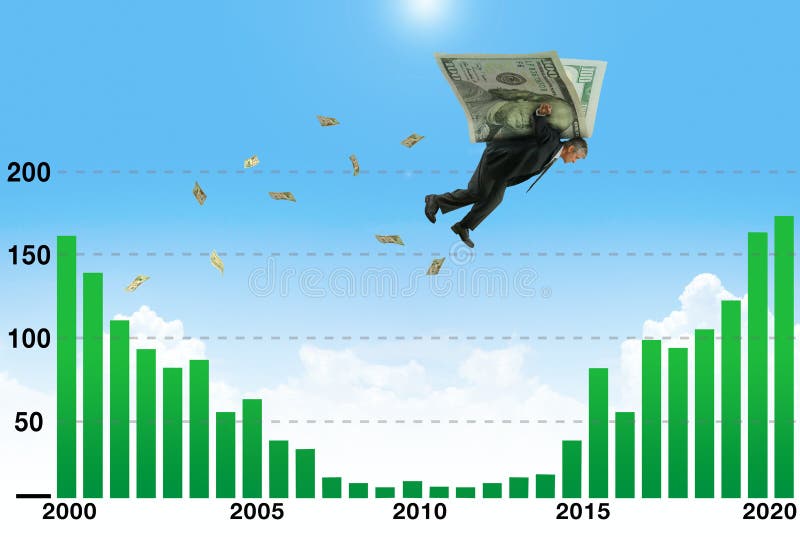 Businessman soaring on wings of money over low earnings part of graph a metaphor for financial and stock market success. Businessman soaring on wings of money royalty free stock photography