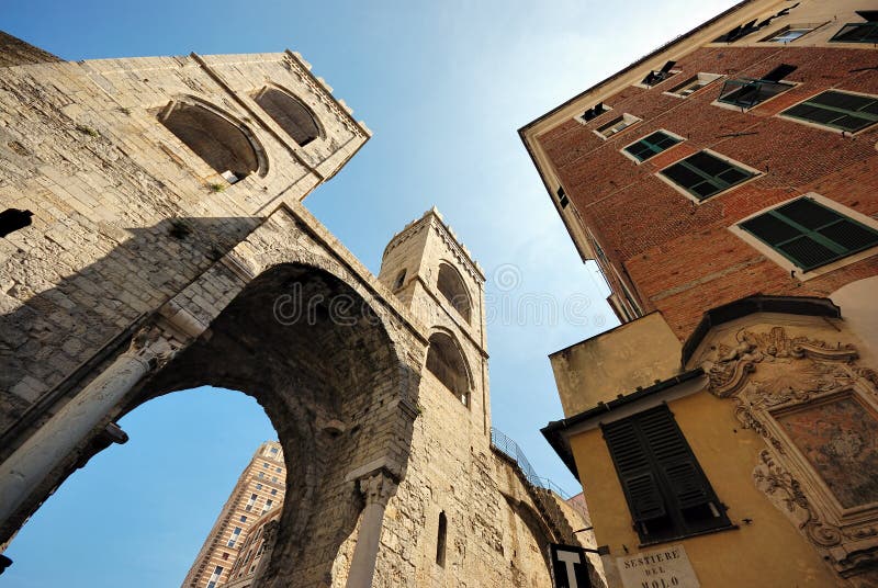 Jenova, old houses, arkh. The old part of the Italian city of Genova, a brick arch extending high into the sky royalty free stock image