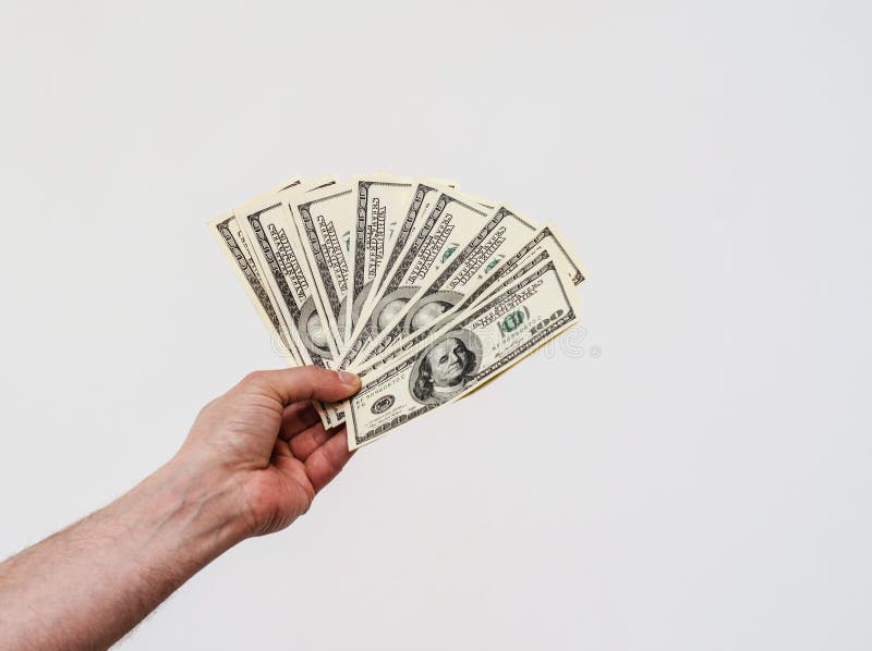 Man hand holds american dollars money. Finance, earnings, crediting.  stock photos
