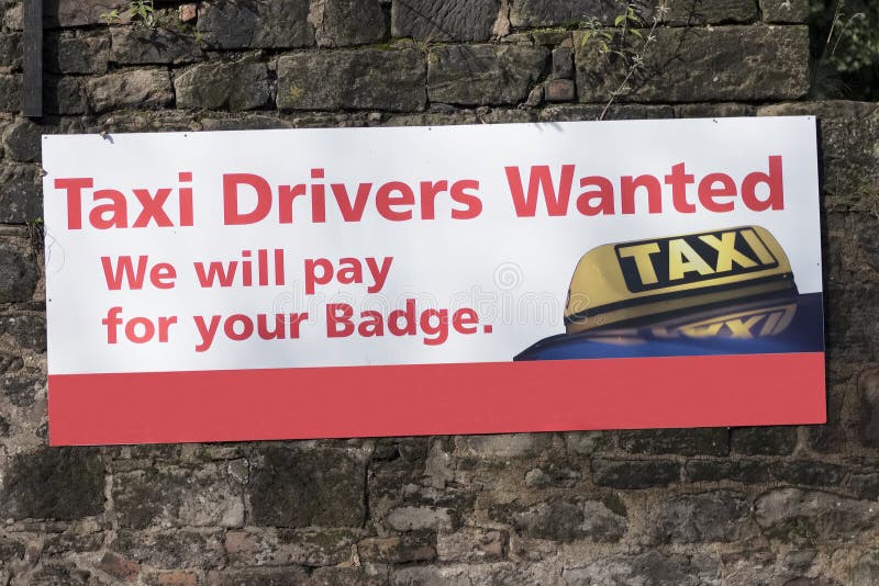 Taxi Drivers Wanted Job Employment Opportunities Sign On Wall Uber royalty free stock image